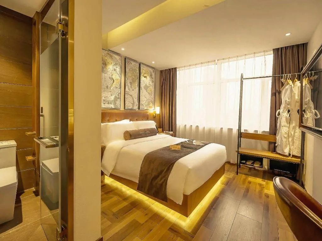 Bed in James Joyce Coffetel Shenyang North Railway Station Qishan Road Metro Station