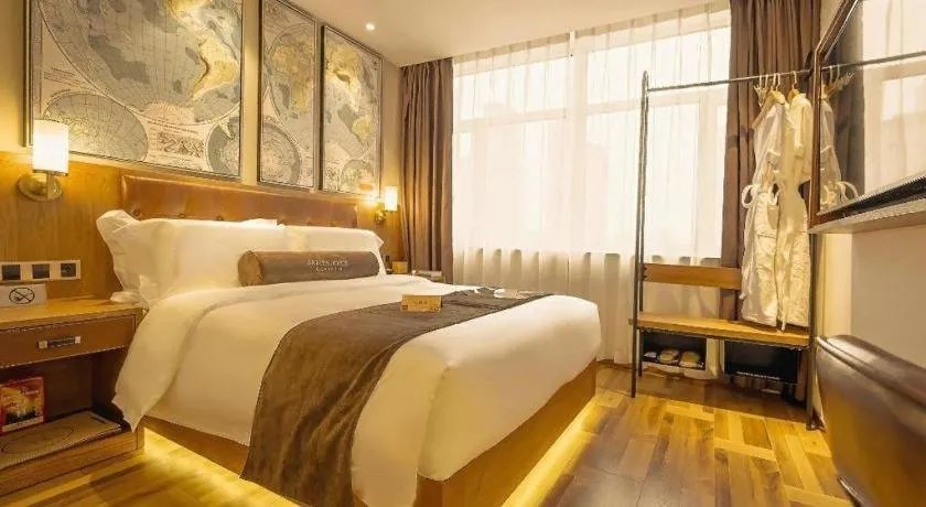 Bed in James Joyce Coffetel Shenyang North Railway Station Qishan Road Metro Station