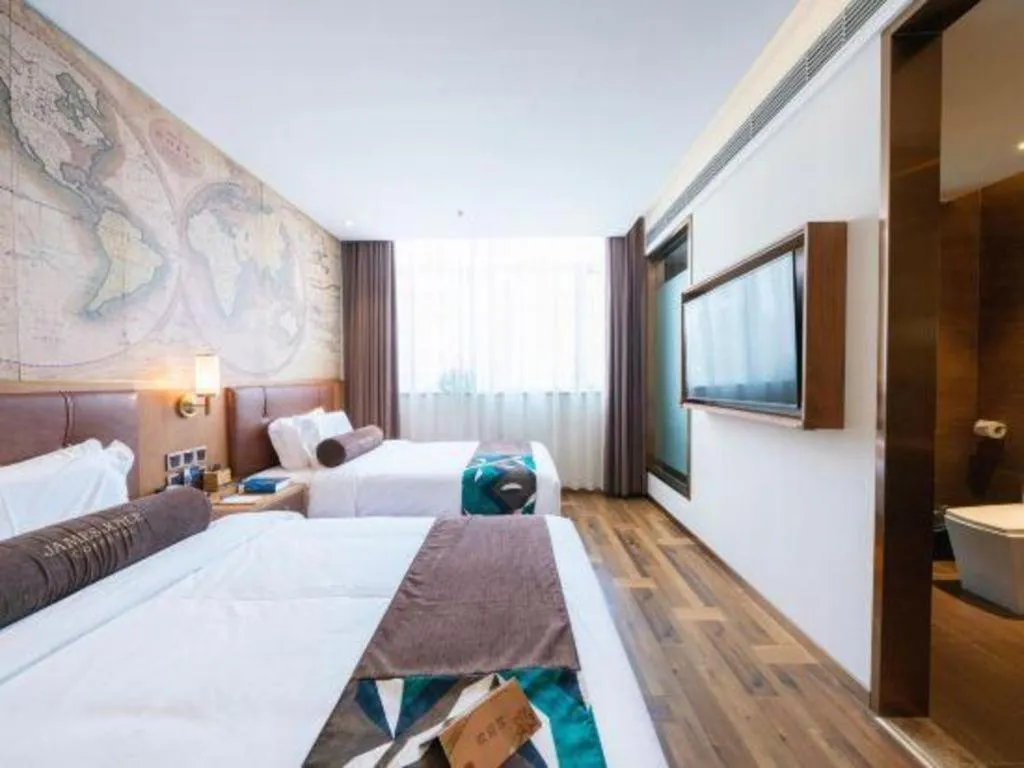 Bed in James Joyce Coffetel Shenyang North Railway Station Qishan Road Metro Station