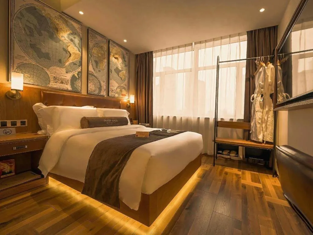 Bed in James Joyce Coffetel Shenyang North Railway Station Qishan Road Metro Station