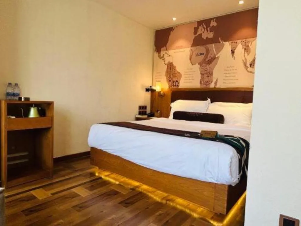 Bed in James Joyce Coffetel Shenyang North Railway Station Qishan Road Metro Station