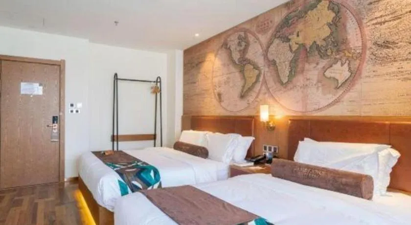 Bed in James Joyce Coffetel Shenyang North Railway Station Qishan Road Metro Station