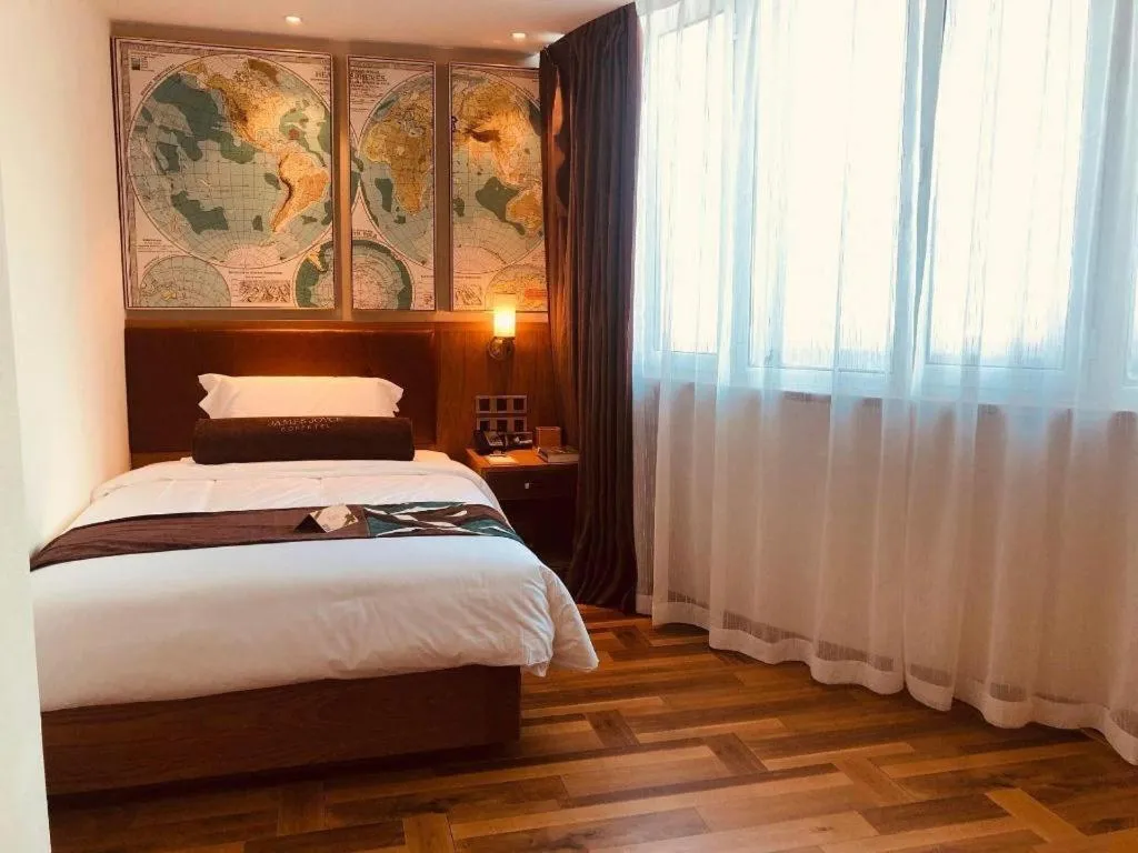 Bed in James Joyce Coffetel Shenyang North Railway Station Qishan Road Metro Station