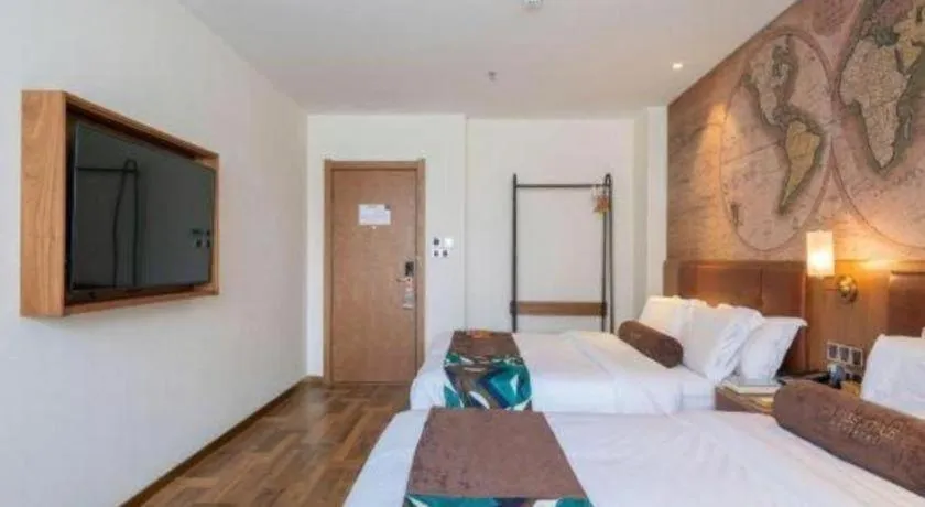 Bed in James Joyce Coffetel Shenyang North Railway Station Qishan Road Metro Station