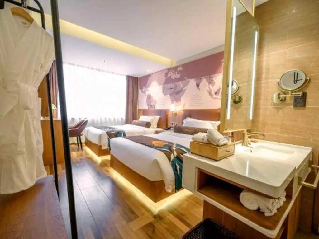 Bed in James Joyce Coffetel Shenyang North Railway Station Qishan Road Metro Station