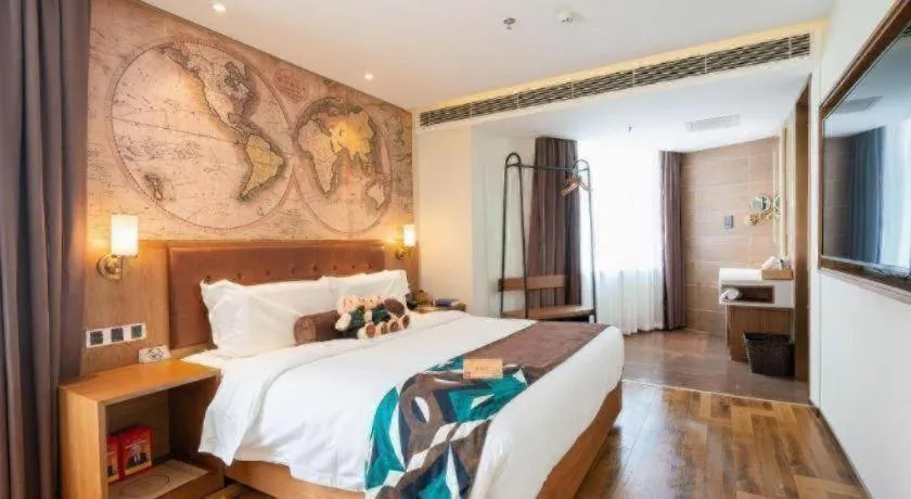 Bed in James Joyce Coffetel Shenyang North Railway Station Qishan Road Metro Station