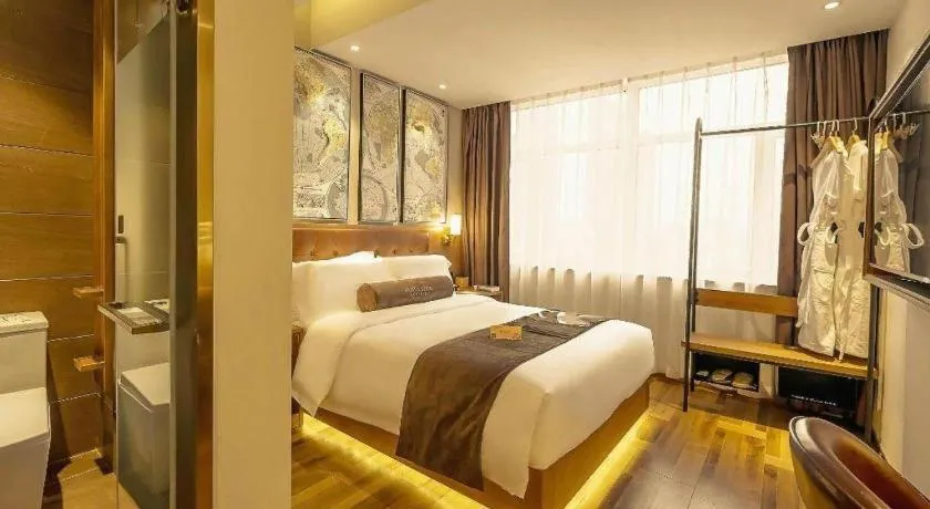 Bed in James Joyce Coffetel Shenyang North Railway Station Qishan Road Metro Station