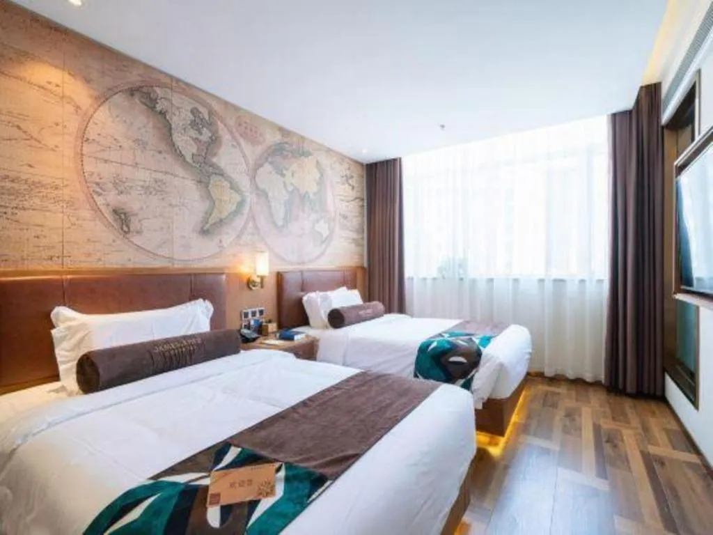 Bed in James Joyce Coffetel Shenyang North Railway Station Qishan Road Metro Station