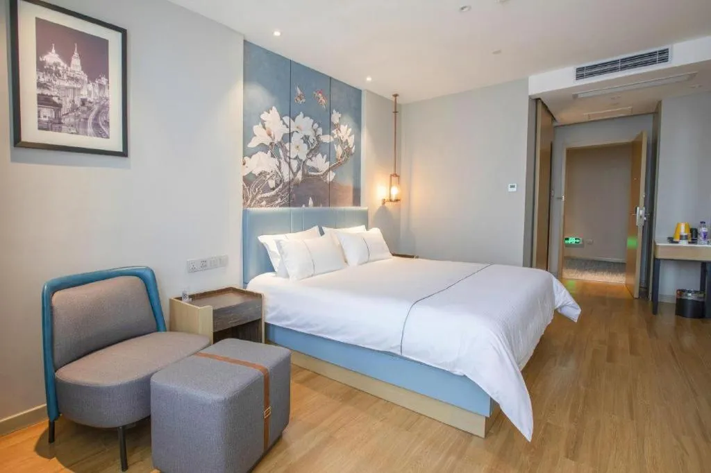 Bed in Magnotel Hotel Dongxing Guomen Port