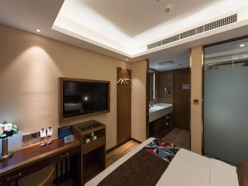 Bed in James Joyce Coffetel Beijing West Railway Station Lianhua Bridge