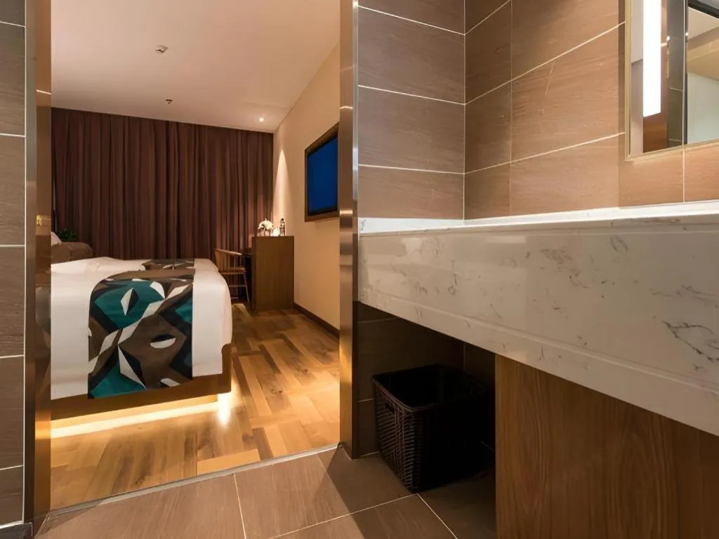 Bed in James Joyce Coffetel Beijing West Railway Station Lianhua Bridge