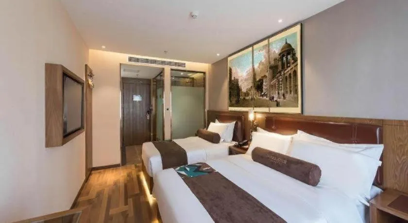 Bed in James Joyce Coffetel Beijing West Railway Station Lianhua Bridge