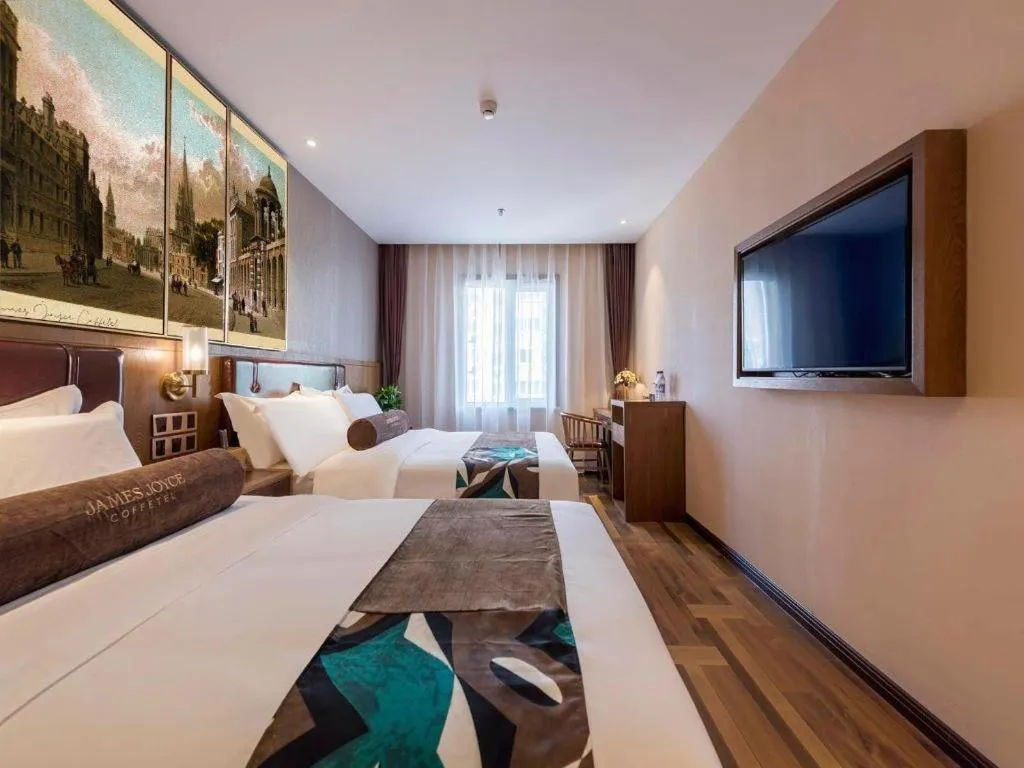 Bed in James Joyce Coffetel Beijing West Railway Station Lianhua Bridge