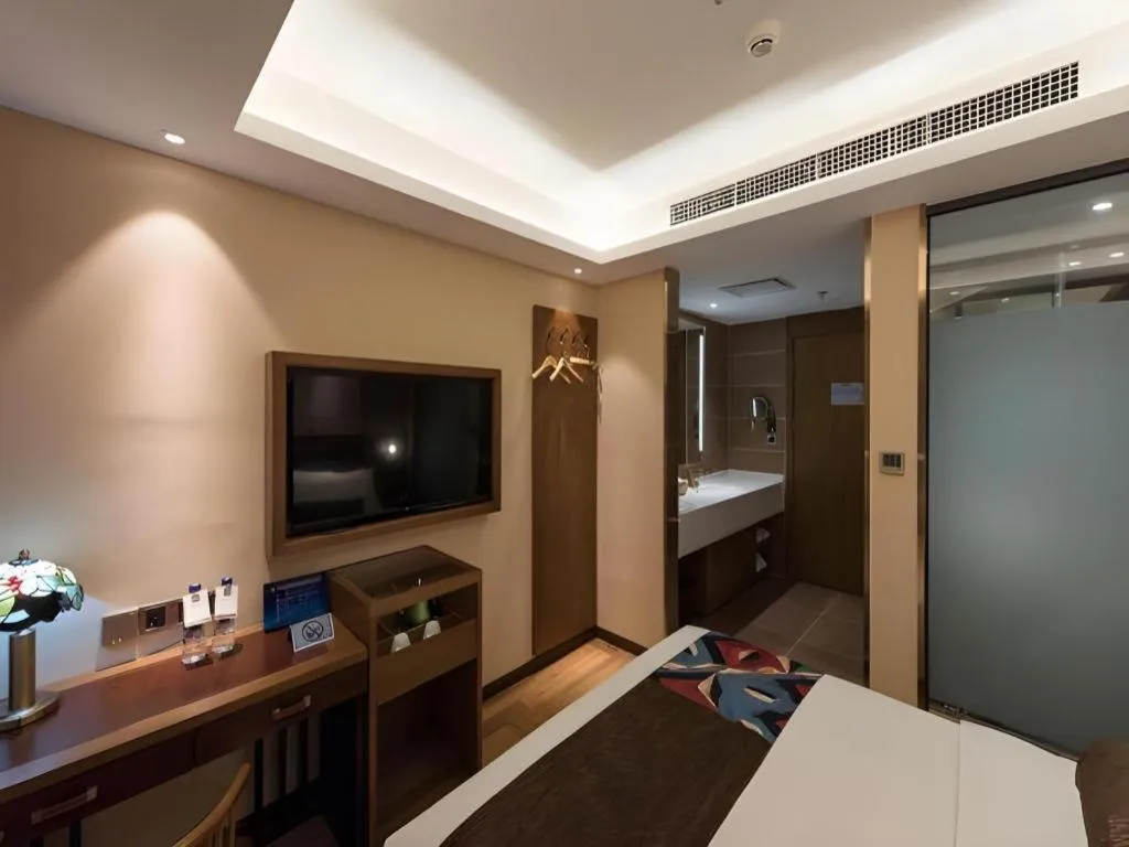 Bed in James Joyce Coffetel Beijing West Railway Station Lianhua Bridge