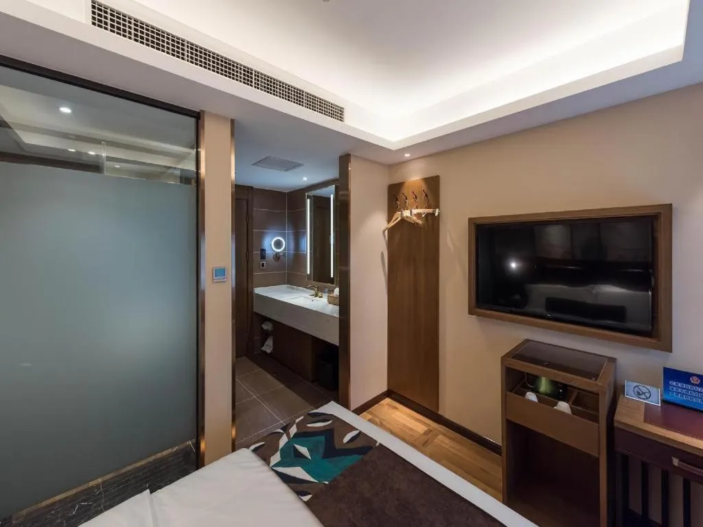 Bed in James Joyce Coffetel Beijing West Railway Station Lianhua Bridge