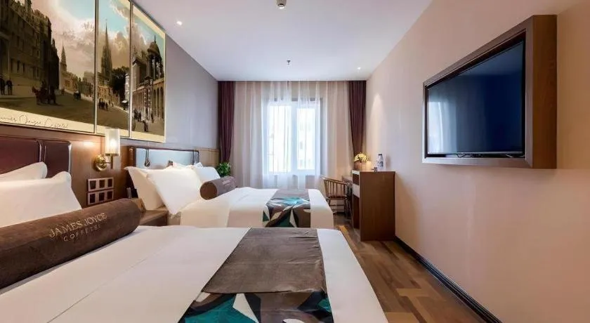 Bed in James Joyce Coffetel Beijing West Railway Station Lianhua Bridge