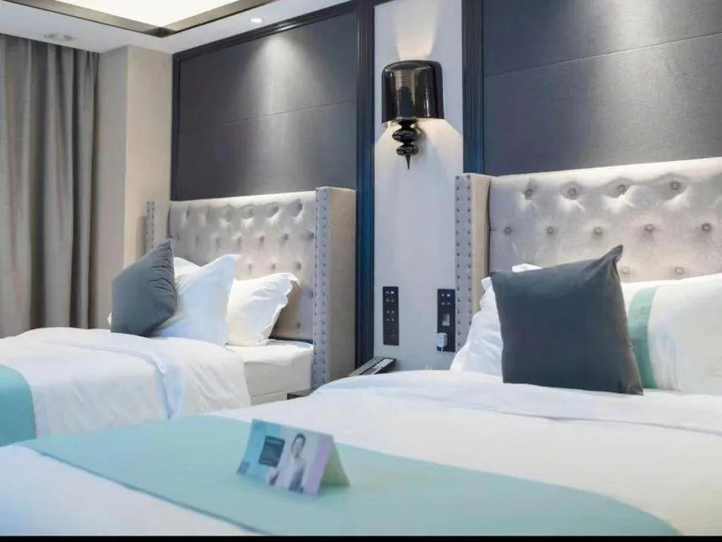 Bed in Xana Hotelle Zhuhai Gongbei Port