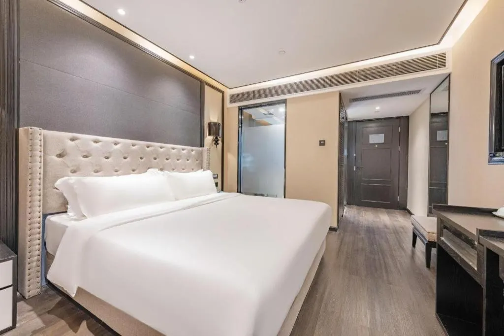 Bed in Xana Hotelle Zhuhai Gongbei Port
