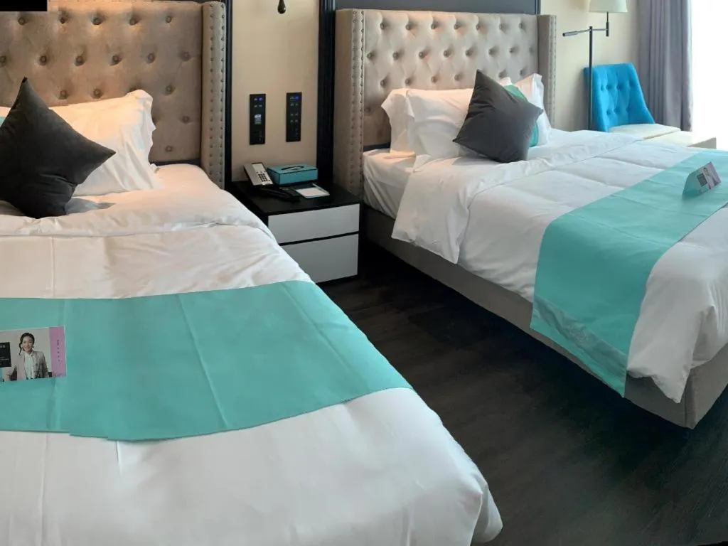 Bed in Xana Hotelle Zhuhai Gongbei Port