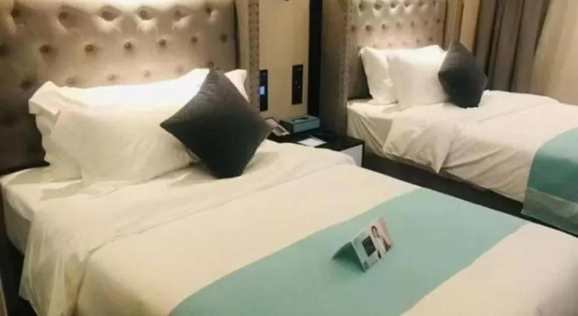 Bed in Xana Hotelle Zhuhai Gongbei Port