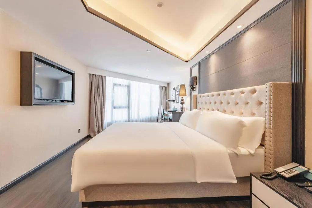 Bed in Xana Hotelle Zhuhai Gongbei Port