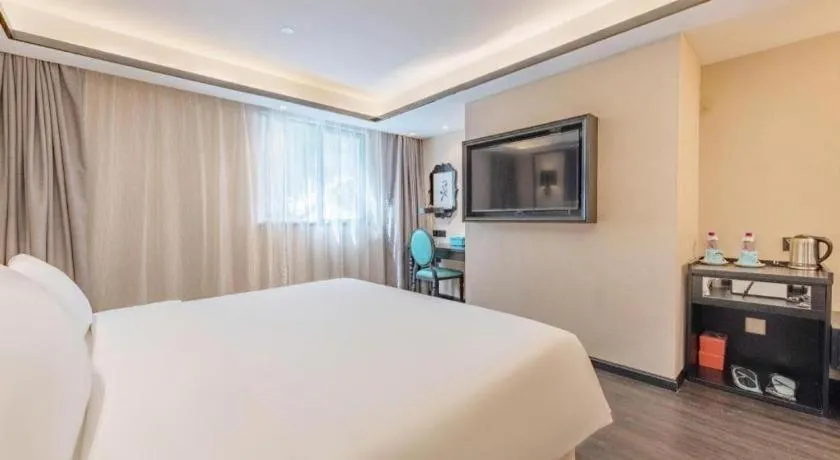 Bed in Xana Hotelle Zhuhai Gongbei Port