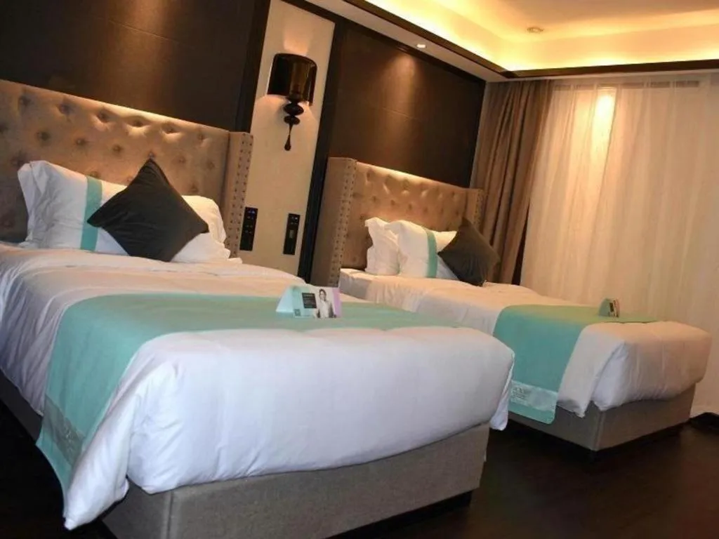 Bed in Xana Hotelle Zhuhai Gongbei Port