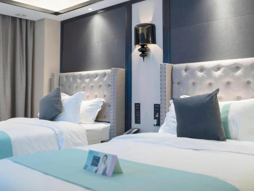 Bed in Xana Hotelle Zhuhai Gongbei Port