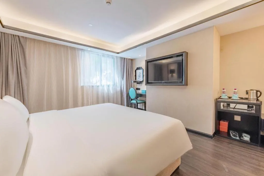 Bed in Xana Hotelle Zhuhai Gongbei Port