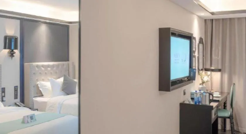 Bed in Xana Hotelle Zhuhai Gongbei Port