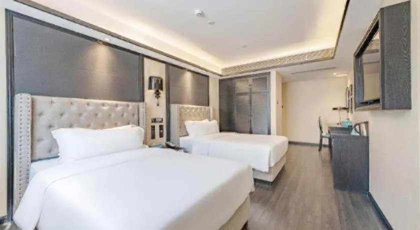 Bed in Xana Hotelle Zhuhai Gongbei Port
