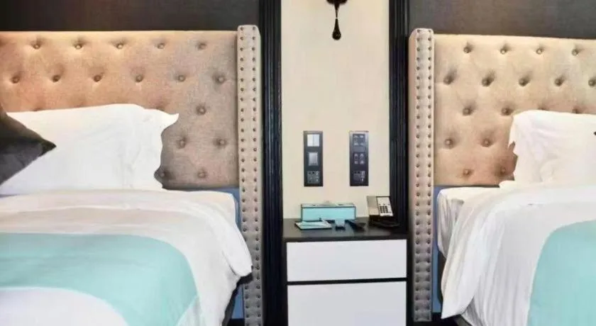 Bed in Xana Hotelle Zhuhai Gongbei Port