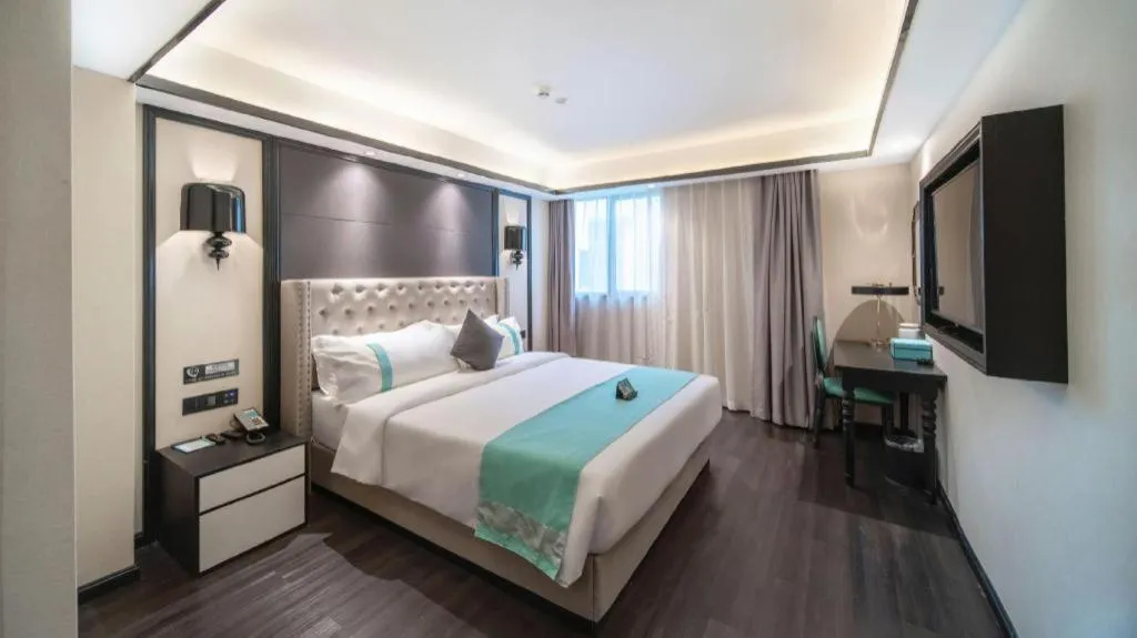 Bed in Xana Hotelle Zhuhai Gongbei Port