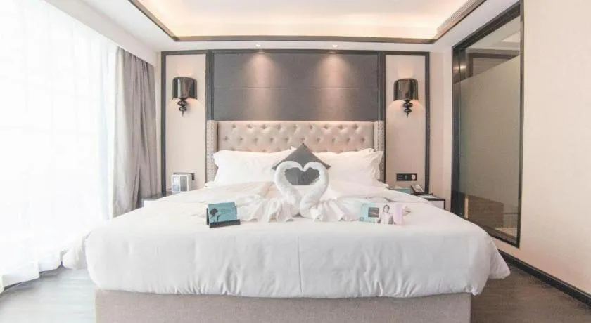 Bed in Xana Hotelle Zhuhai Gongbei Port