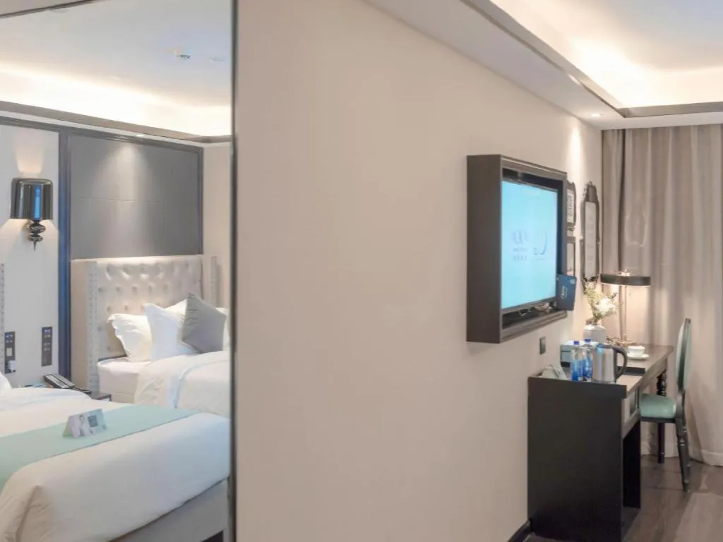 Bed in Xana Hotelle Zhuhai Gongbei Port