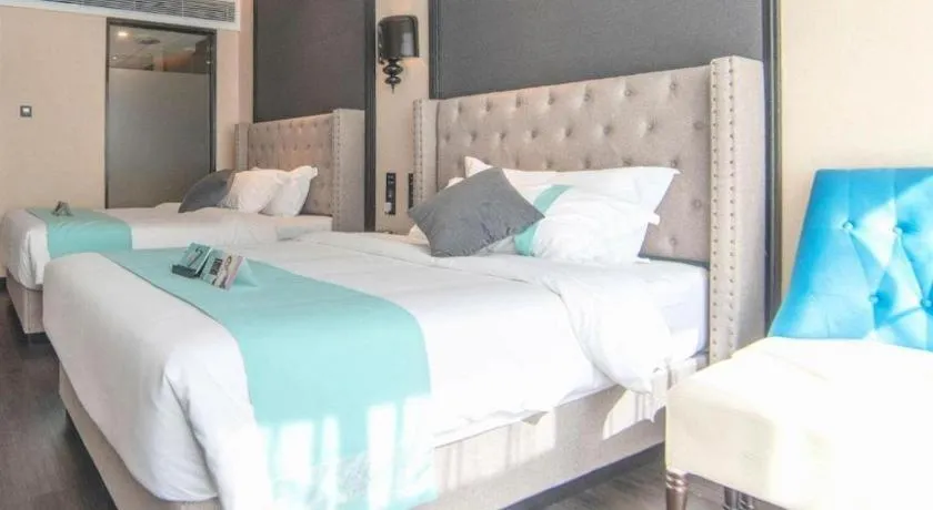 Bed in Xana Hotelle Zhuhai Gongbei Port