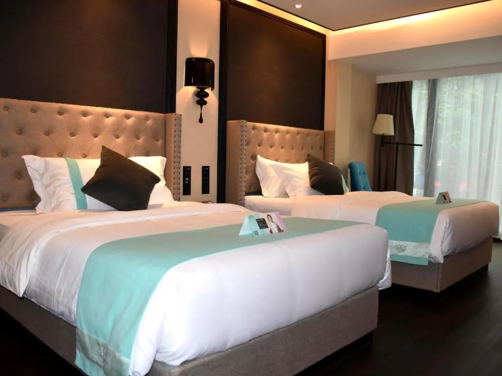 Bed in Xana Hotelle Zhuhai Gongbei Port