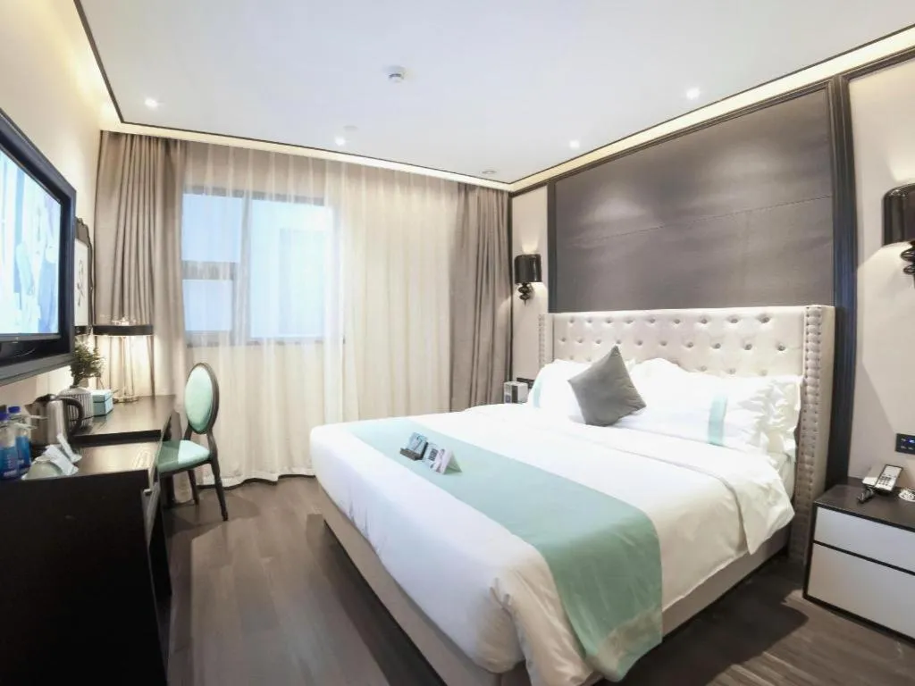 Bed in Xana Hotelle Zhuhai Gongbei Port