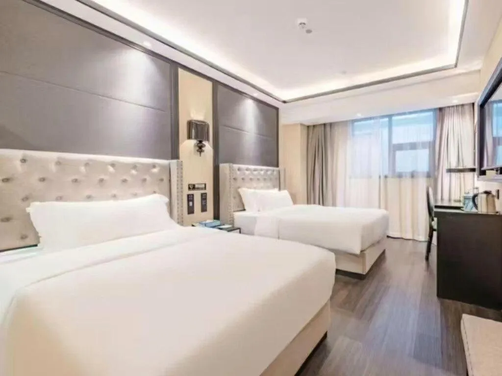 Bed in Xana Hotelle Zhuhai Gongbei Port