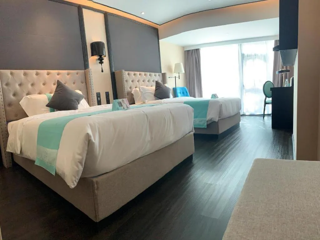 Bed in Xana Hotelle Zhuhai Gongbei Port