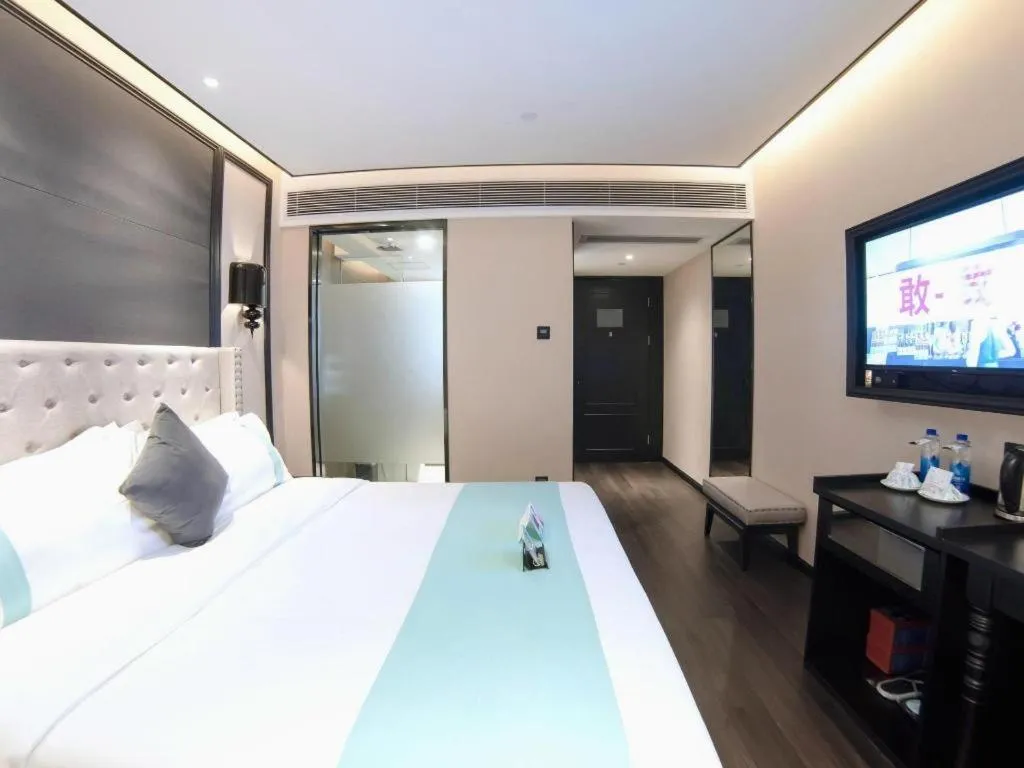 Bed in Xana Hotelle Zhuhai Gongbei Port