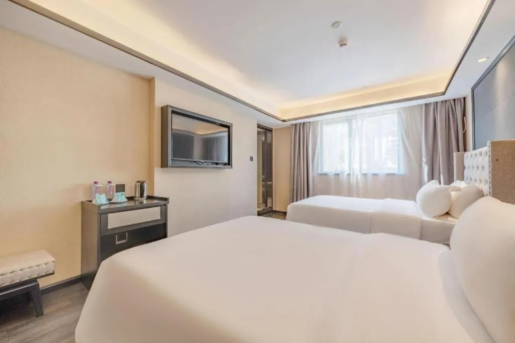 Bed in Xana Hotelle Zhuhai Gongbei Port