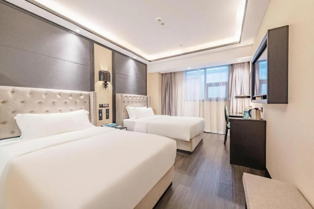 Bed in Xana Hotelle Zhuhai Gongbei Port