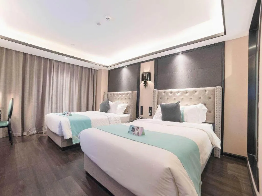 Bed in Xana Hotelle Zhuhai Gongbei Port