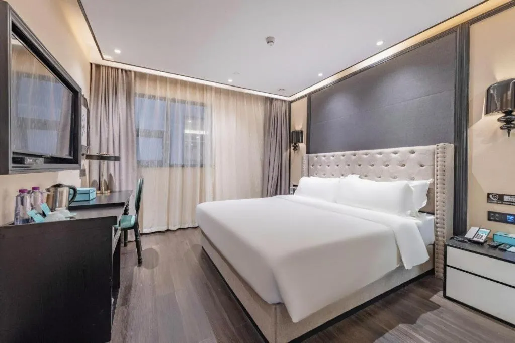 Bed in Xana Hotelle Zhuhai Gongbei Port