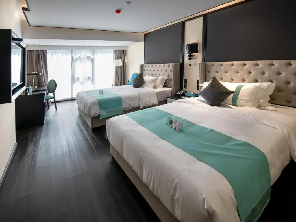 Bed in Xana Hotelle Zhuhai Gongbei Port