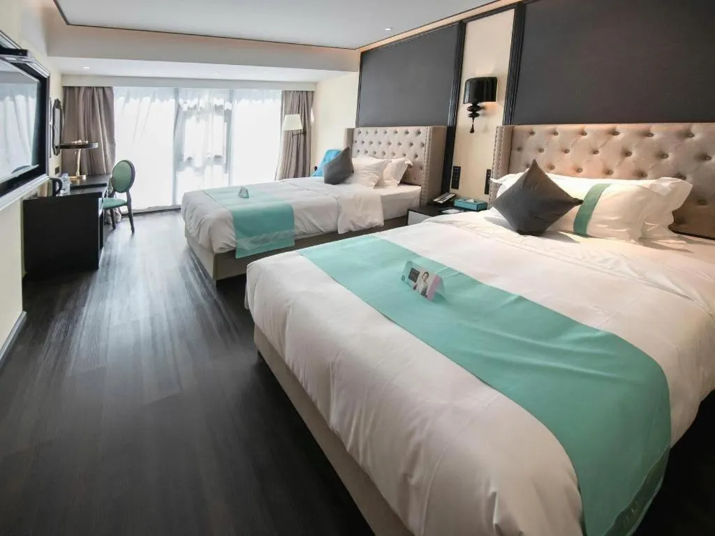 Bed in Xana Hotelle Zhuhai Gongbei Port