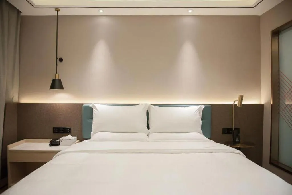 Bed in Zmax Hotel Guangzhou Railway Station