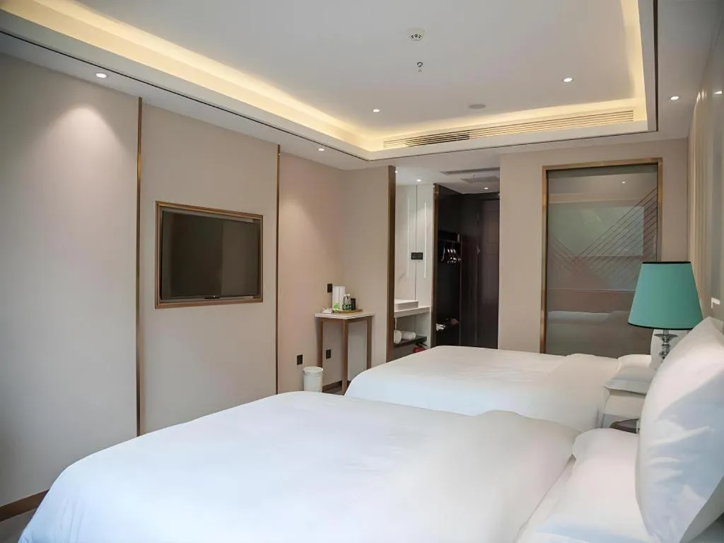 Bed in Zmax Hotel Guangzhou Railway Station