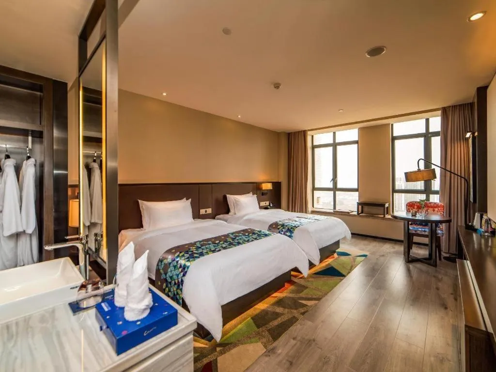 Bed in Zmax Hotel Guangzhou Railway Station